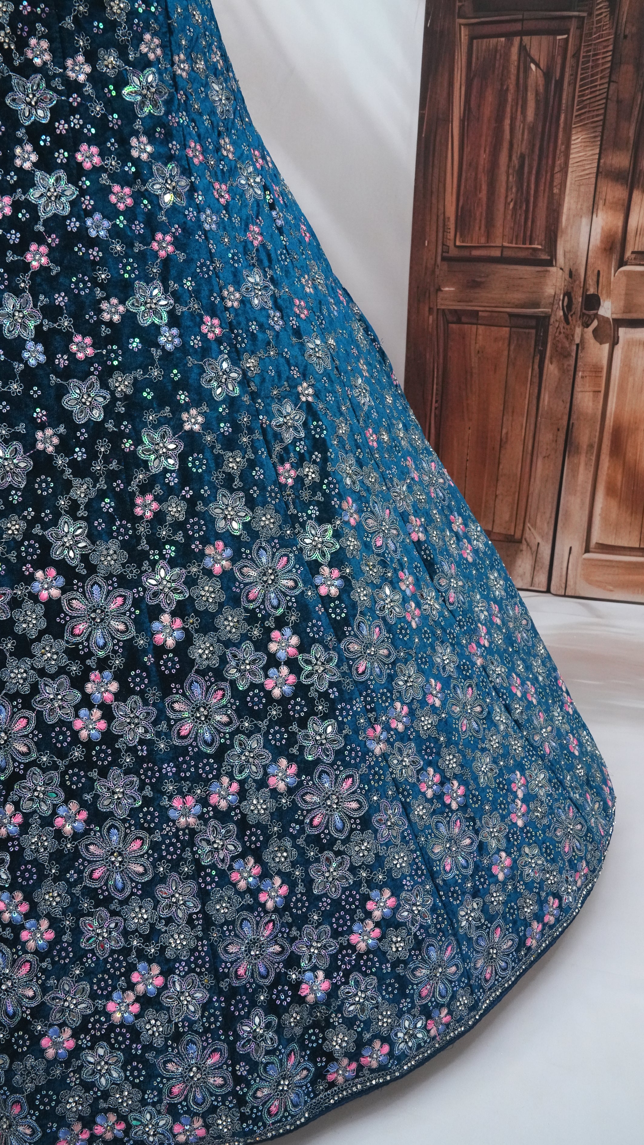 Teal wine Velvet Lehenga Choli with Floral Embroidery & Net Dupatta