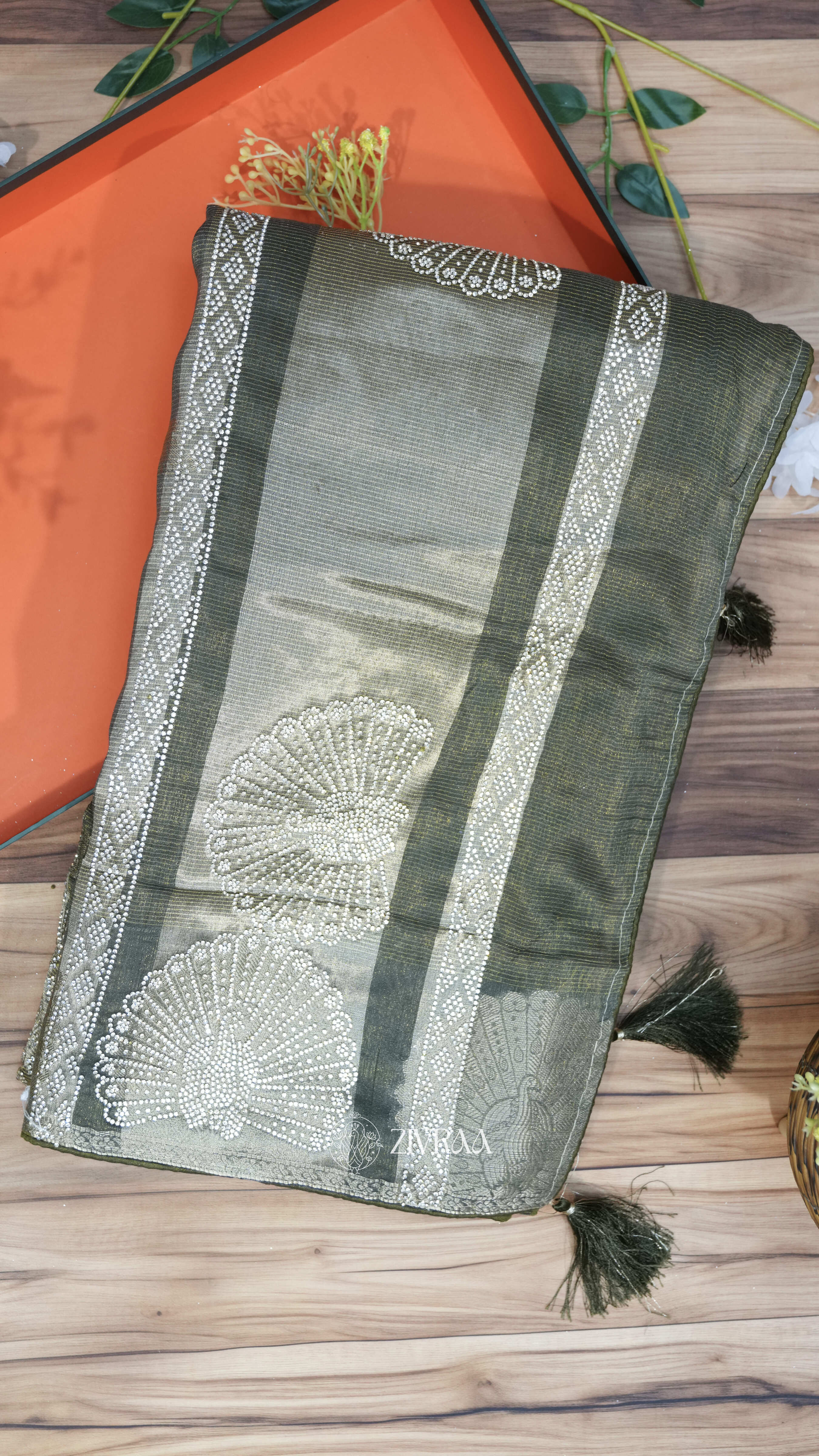 Mustard machine woven Saree with Silver Motifs & Tassel Pallu