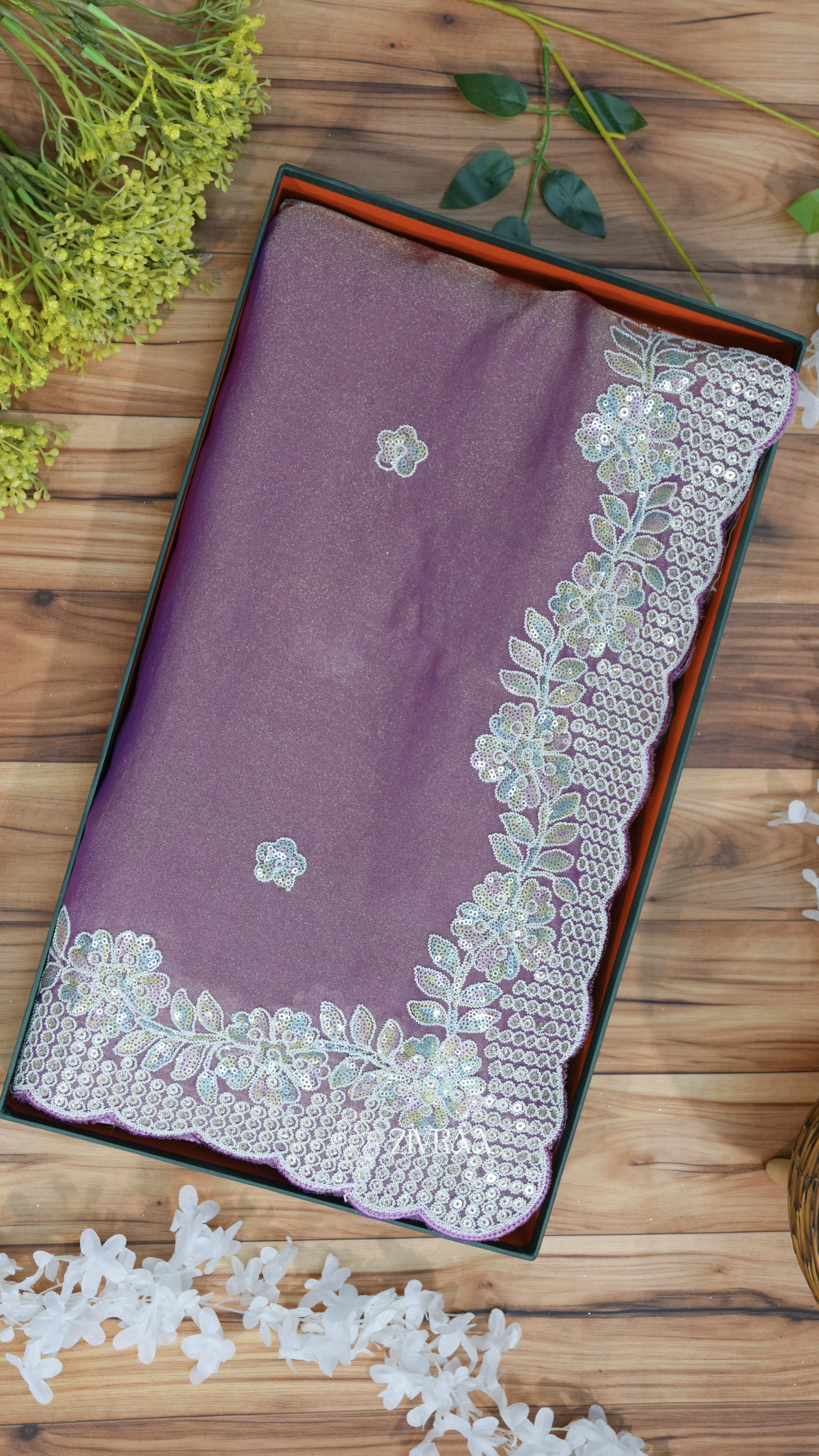 elegant sea green saree with a sequin and thread embroidery