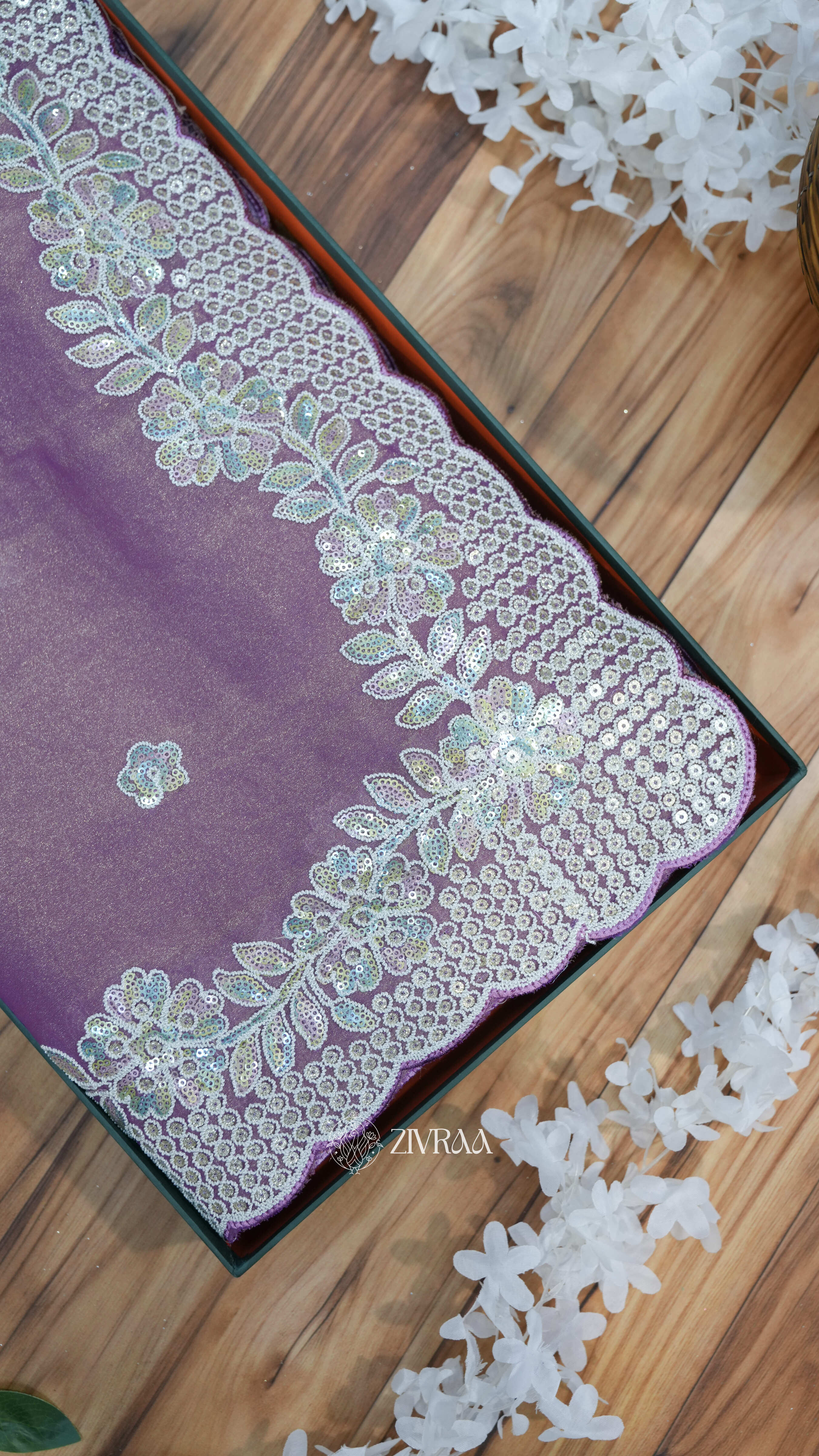 elegant sea green saree with a sequin and thread embroidery