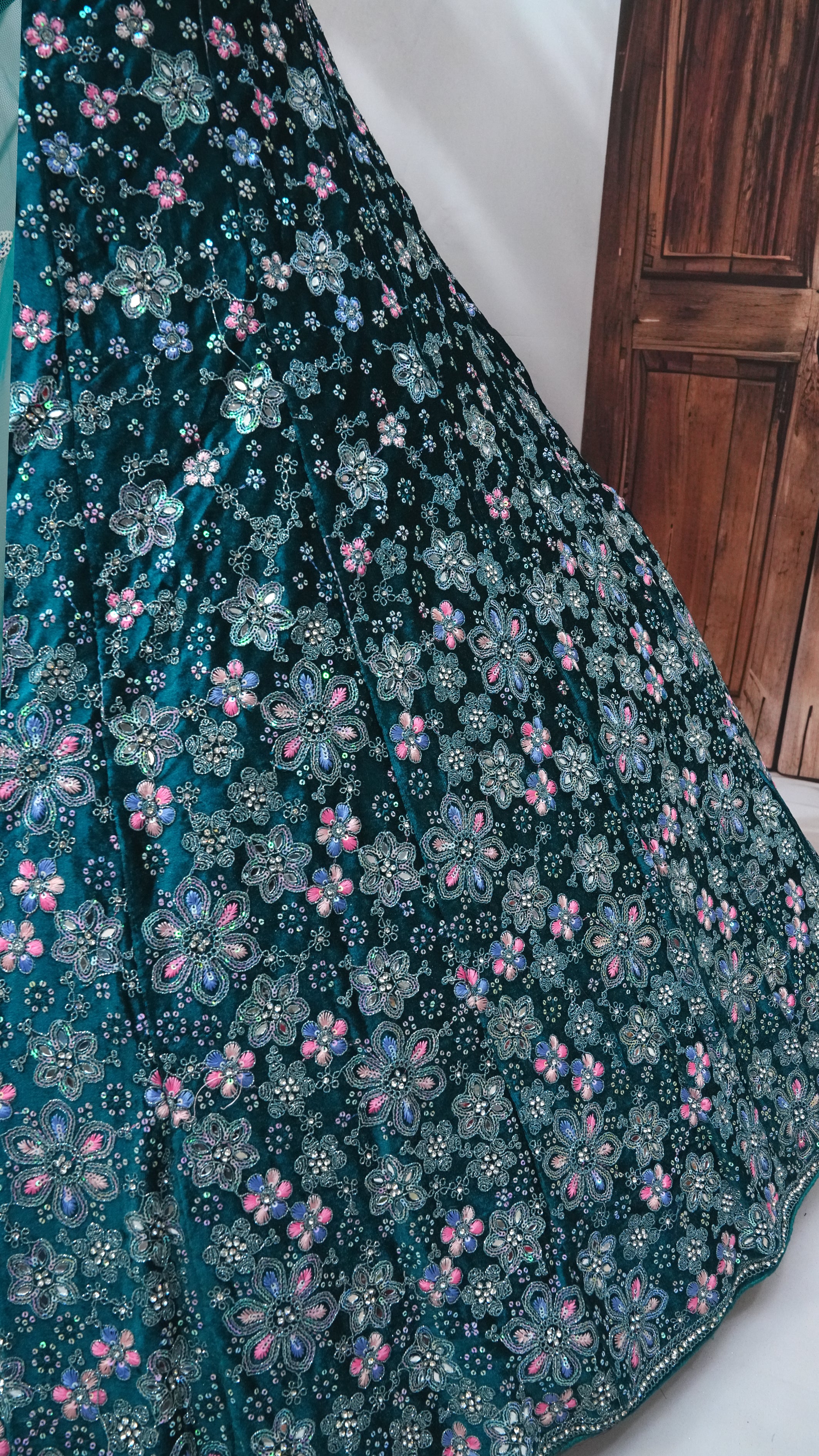 Teal wine Velvet Lehenga Choli with Floral Embroidery & Net Dupatta