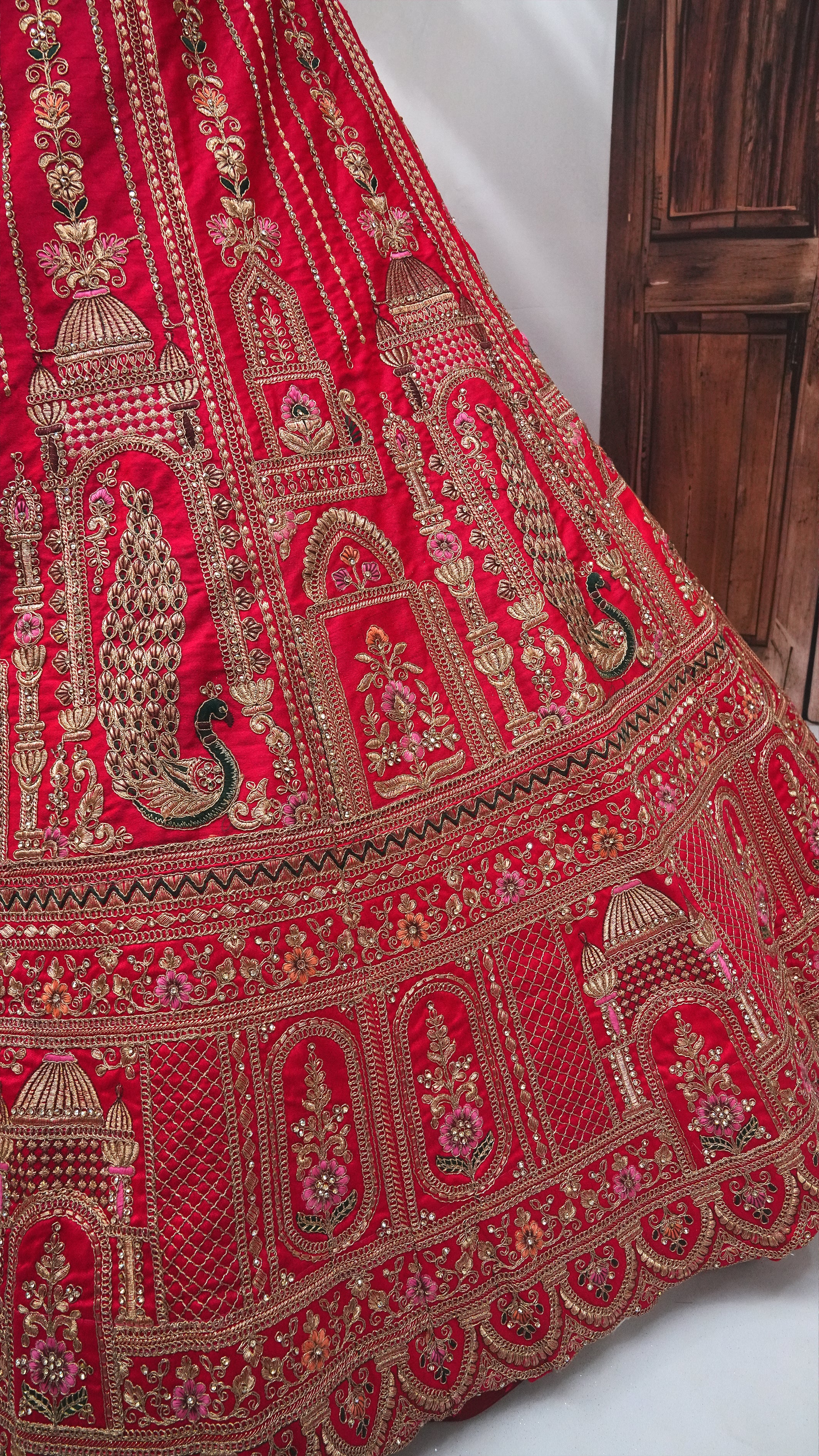 Rani Bridal Lehenga Choli with Heavy Gold Embroidery & Net Dupatta