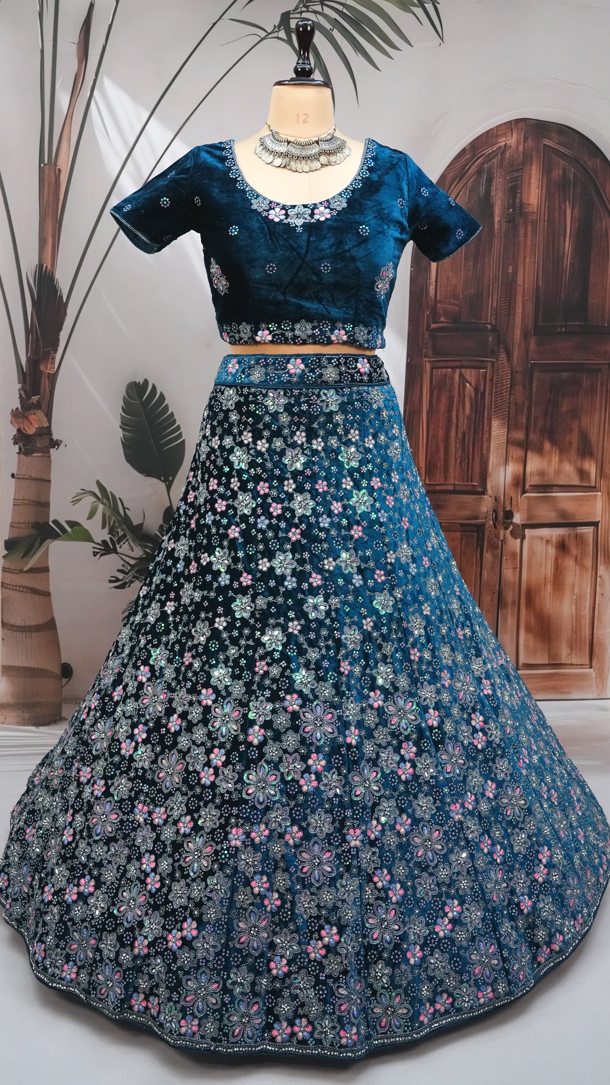 Teal wine Velvet Lehenga Choli with Floral Embroidery & Net Dupatta