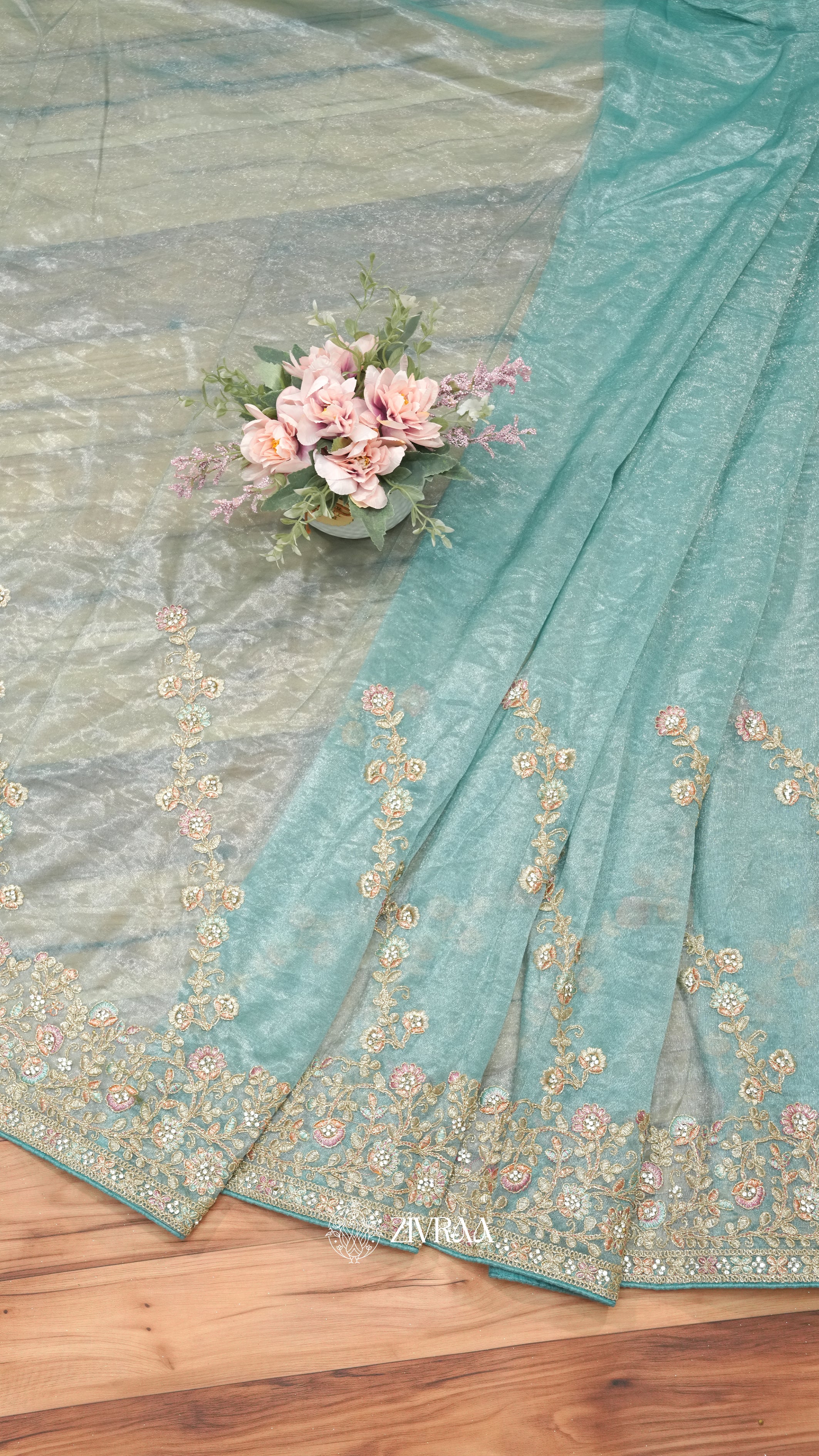 Peach shimmer net Saree with Heavy Floral Embroidery & Designer Border