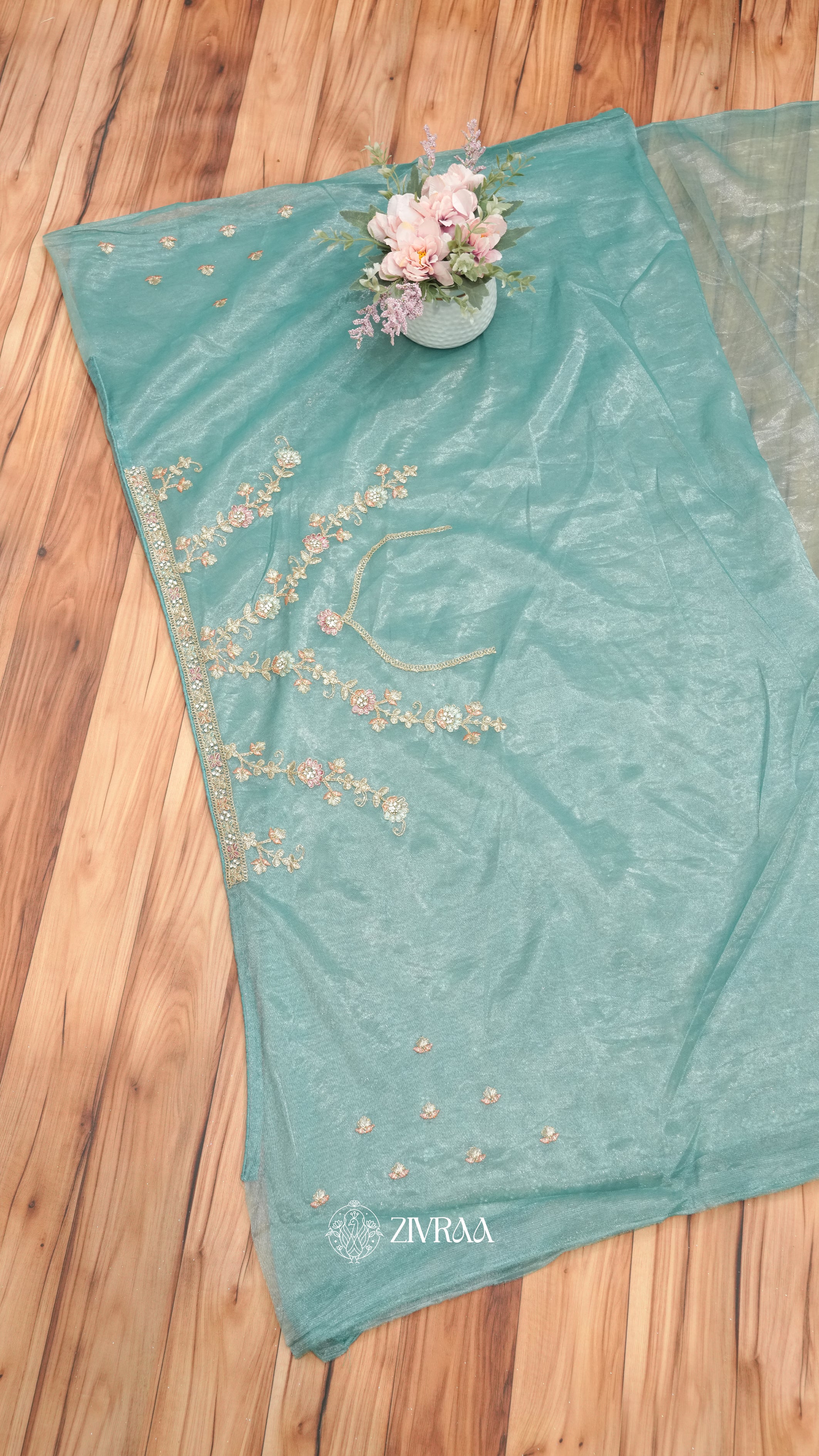 Elegant Teal Green Embroidered Shimmer Net Saree with Floral Zari & Stone Work