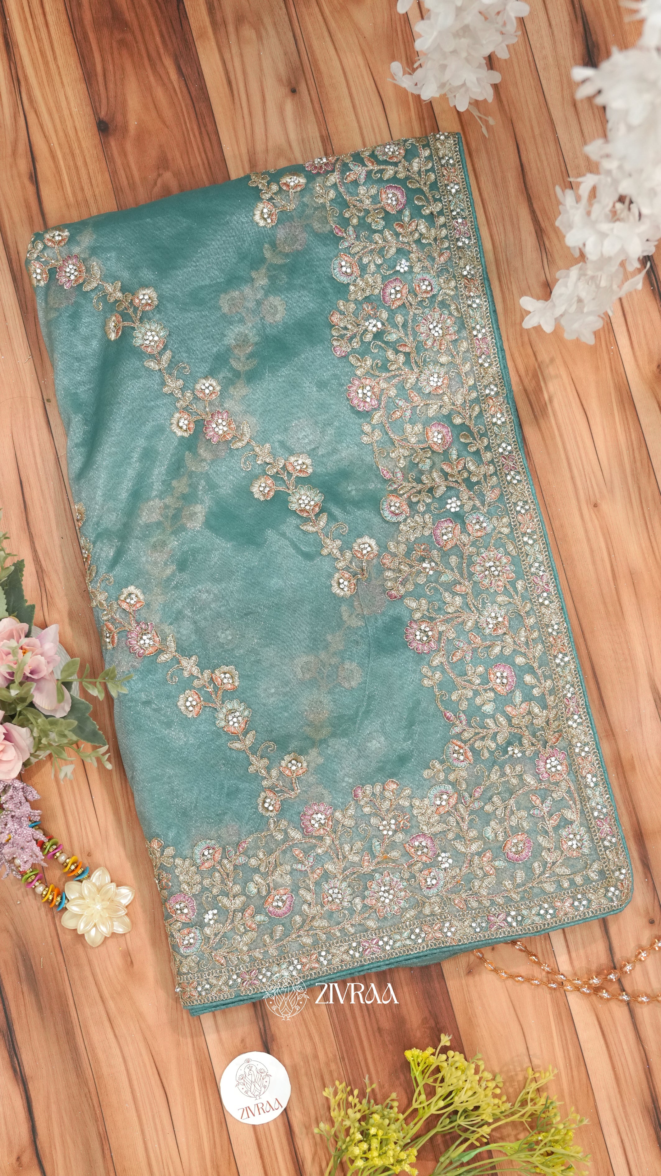 Peach shimmer net Saree with Heavy Floral Embroidery & Designer Border