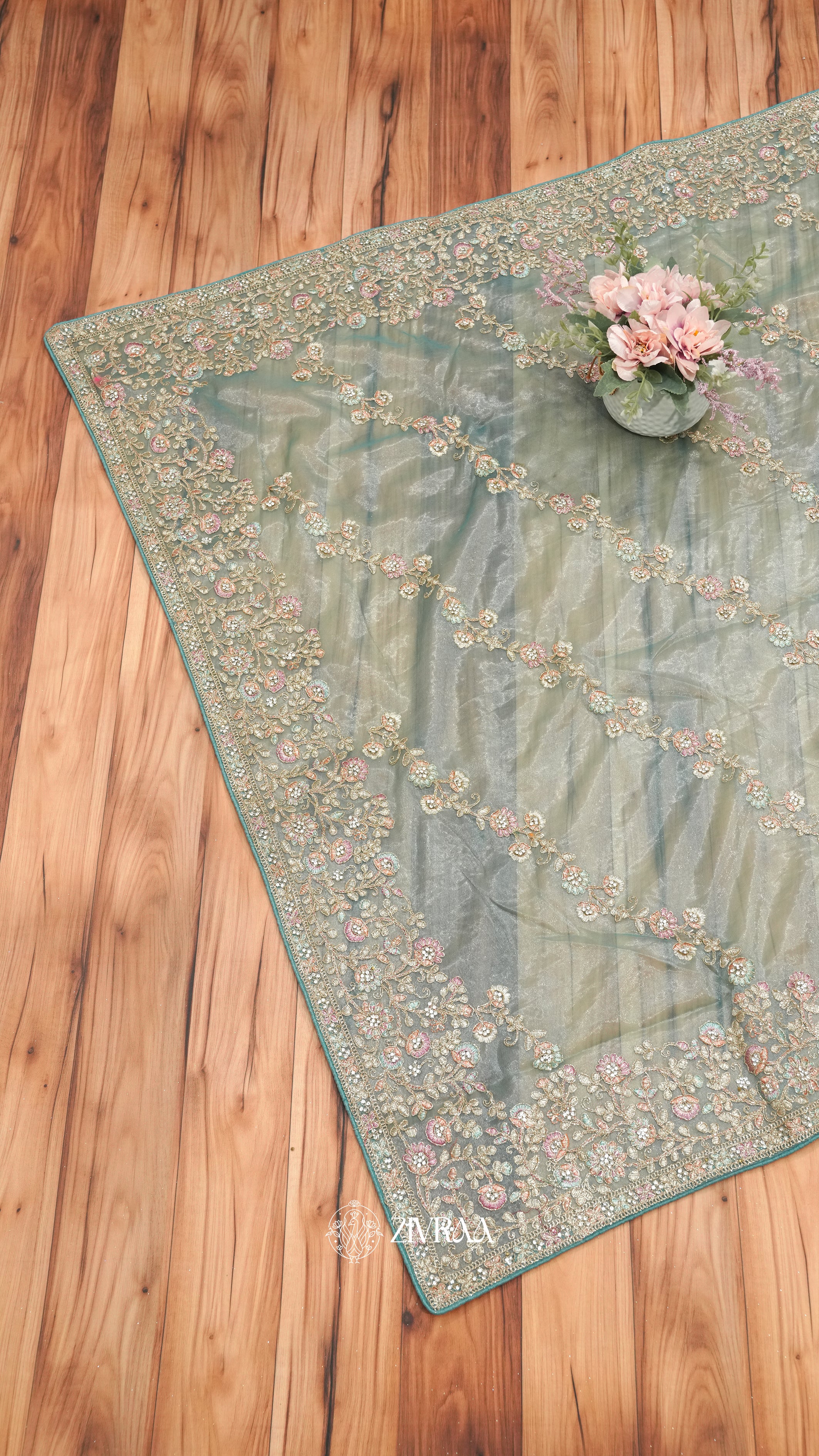 Gold Embroidered shimmer net Saree with Floral Zari & Border