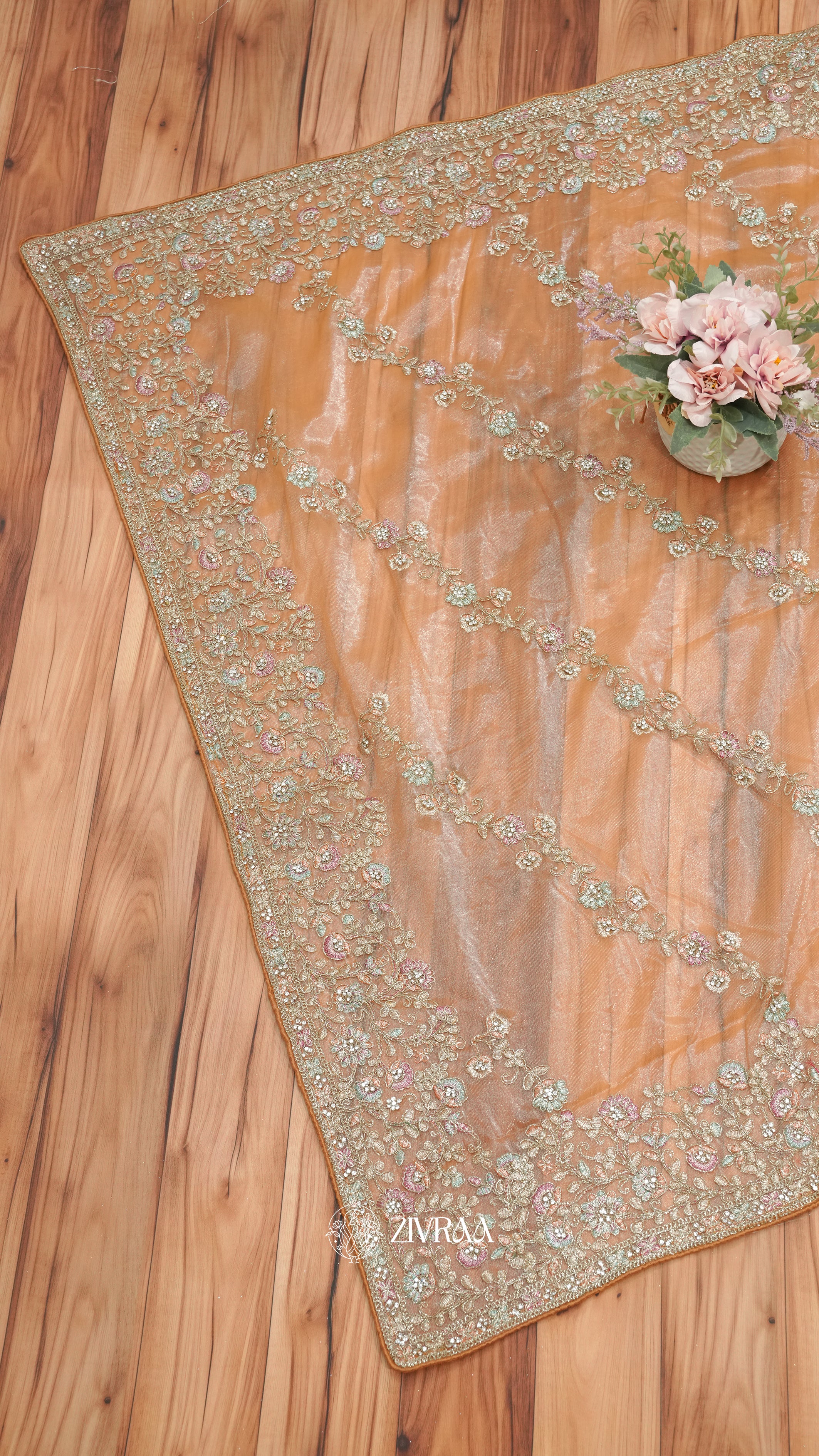 Lavender Shimmer net Saree with Heavy Floral Zari & Stone Embroidery Border