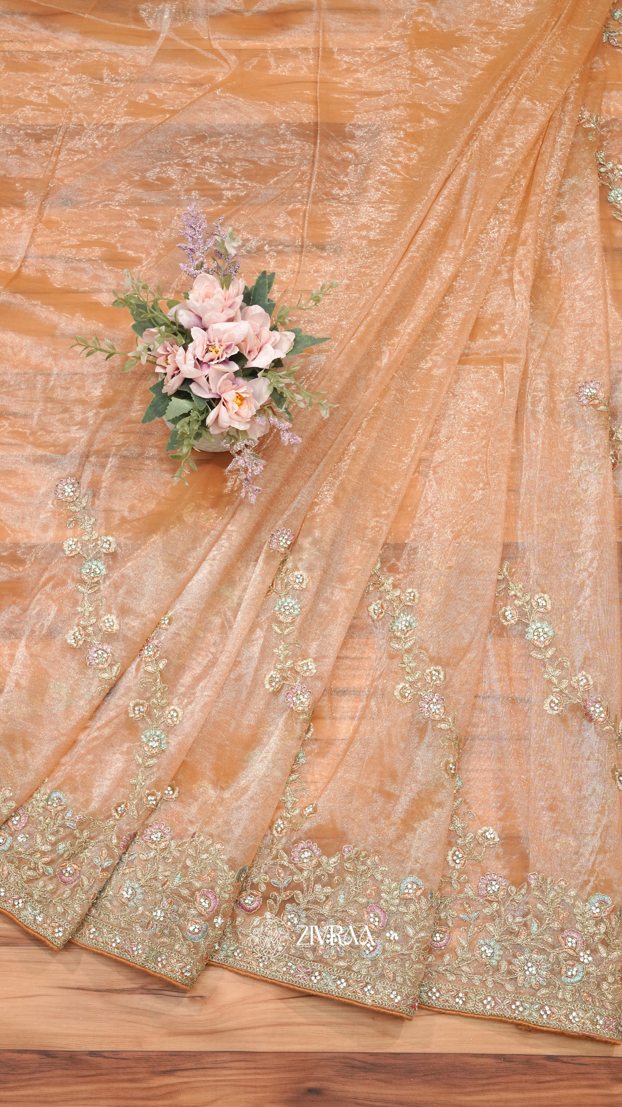 Lavender Shimmer net Saree with Heavy Floral Zari & Stone Embroidery Border