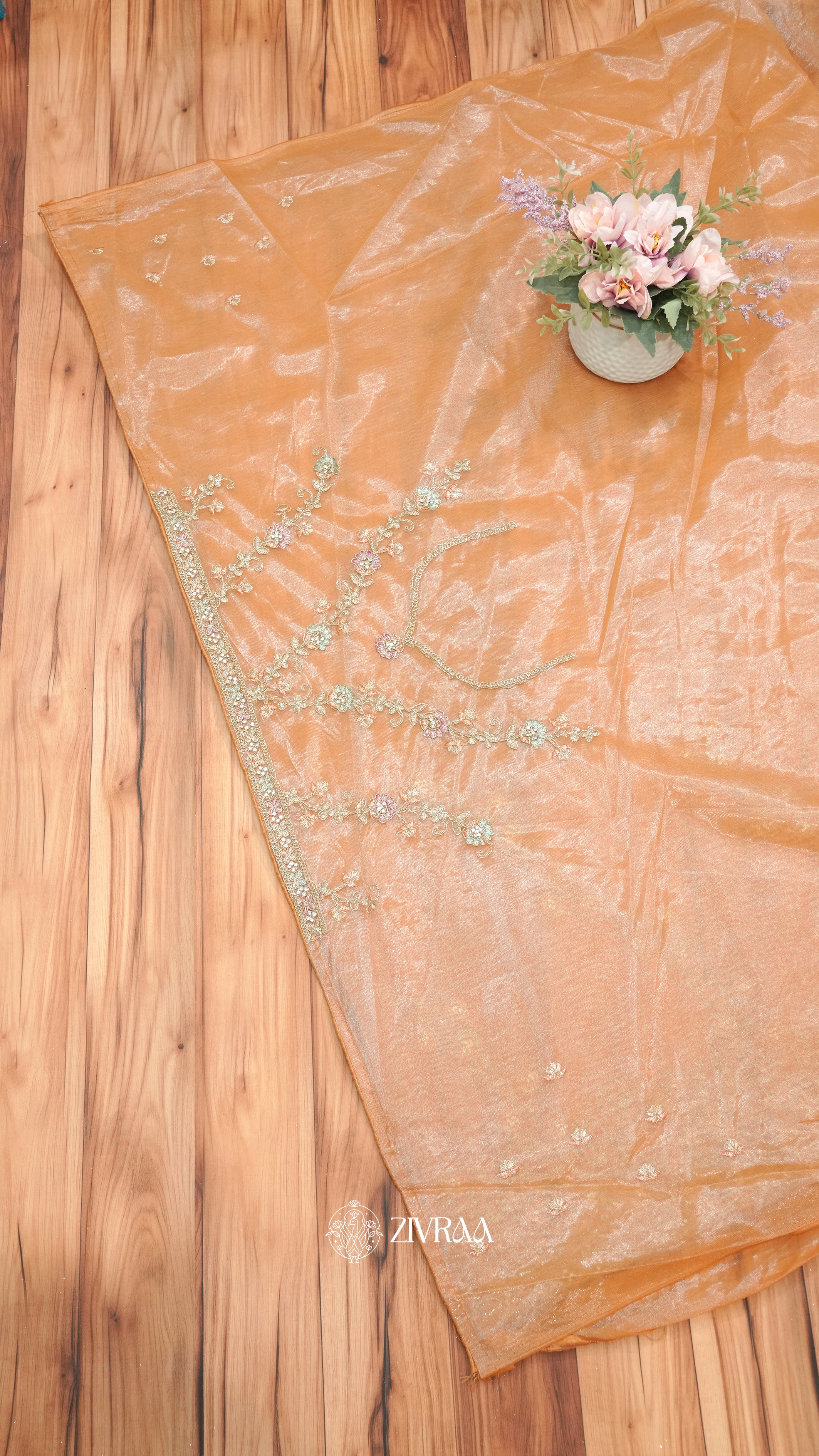 Lavender Shimmer net Saree with Heavy Floral Zari & Stone Embroidery Border