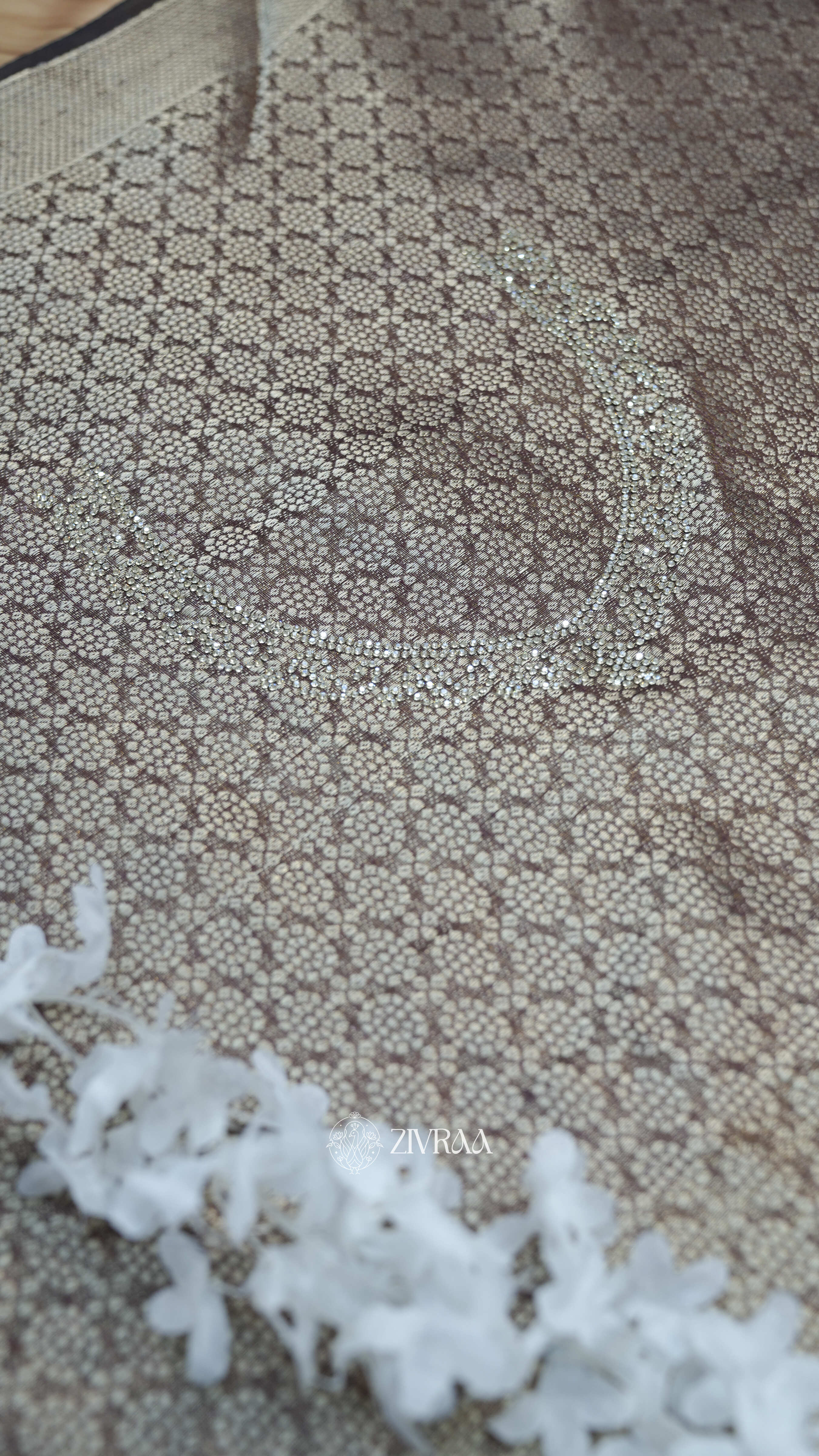 Mustard machine woven Saree with Silver Motifs & Tassel Pallu