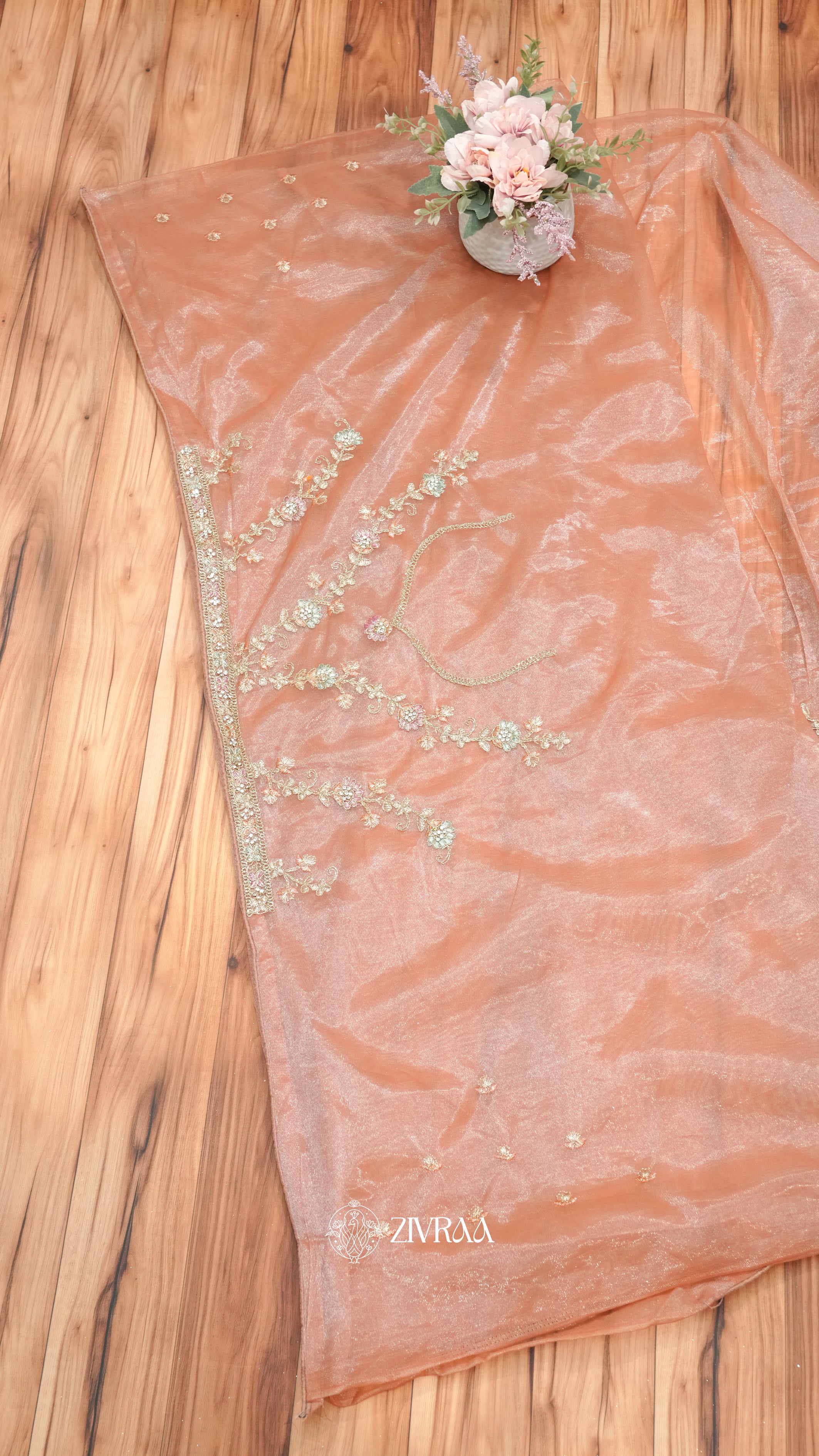 Peach shimmer net Saree with Heavy Floral Embroidery & Designer Border