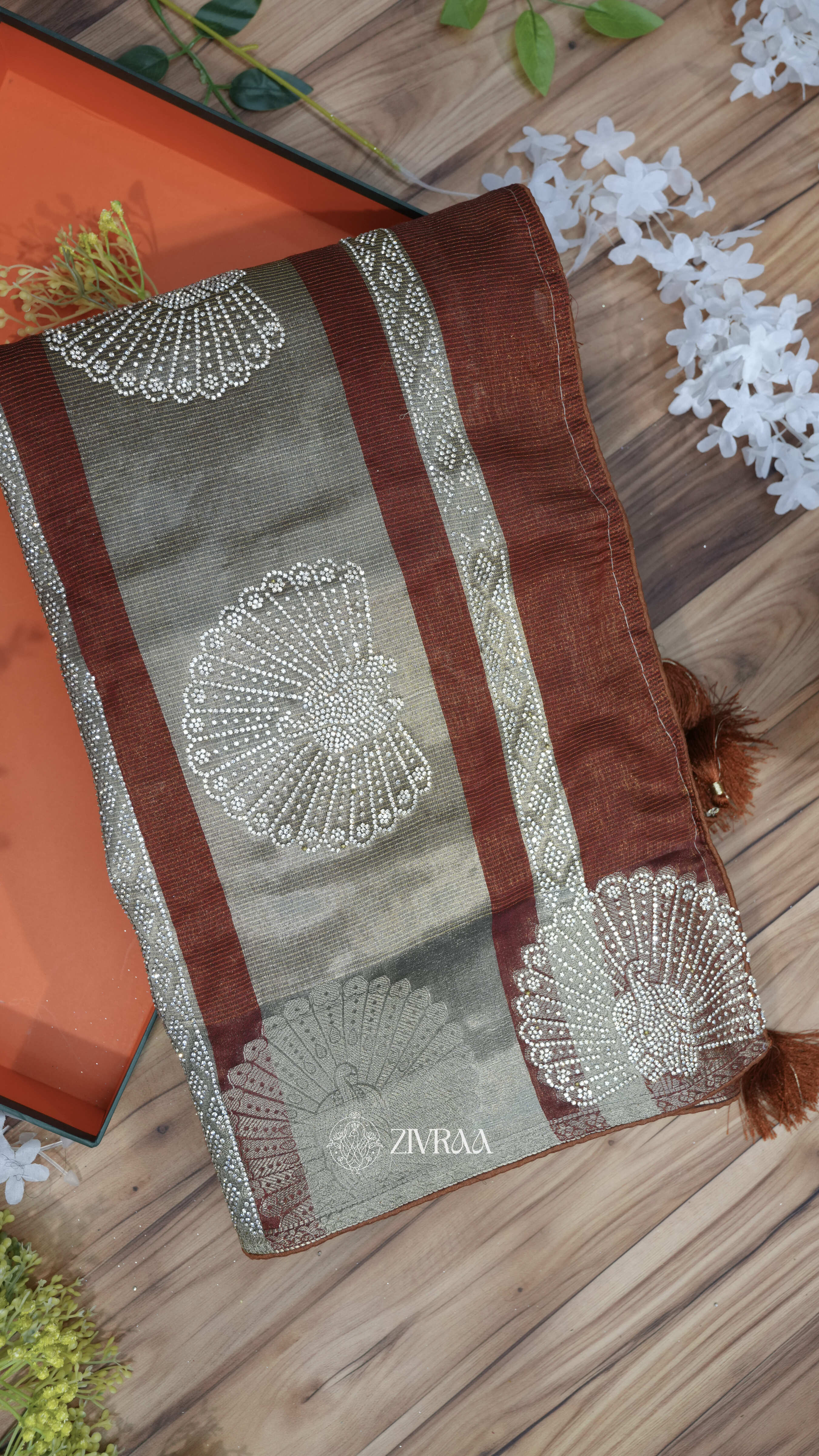 Mustard machine woven Saree with Silver Motifs & Tassel Pallu