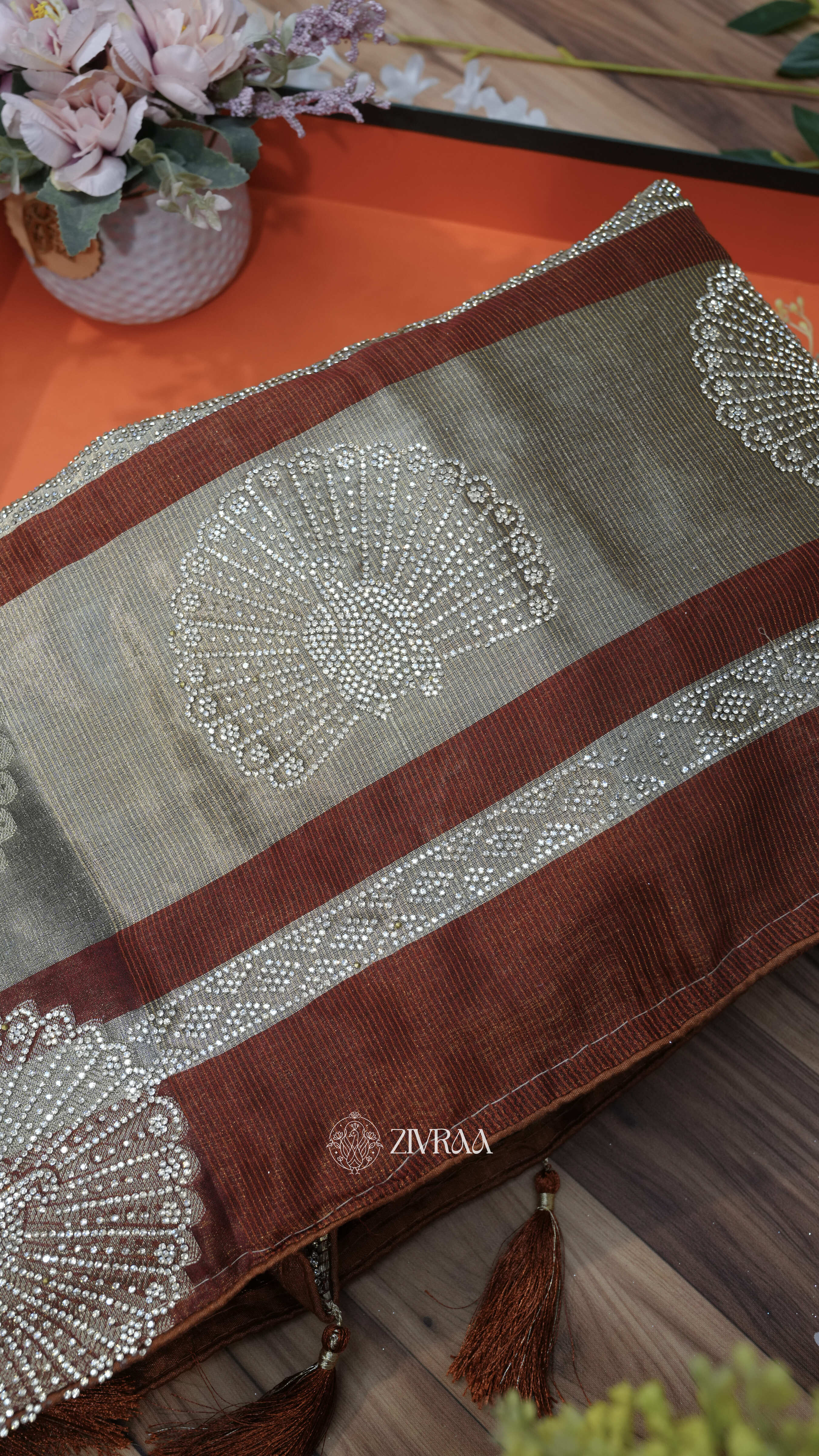 Mustard machine woven Saree with Silver Motifs & Tassel Pallu