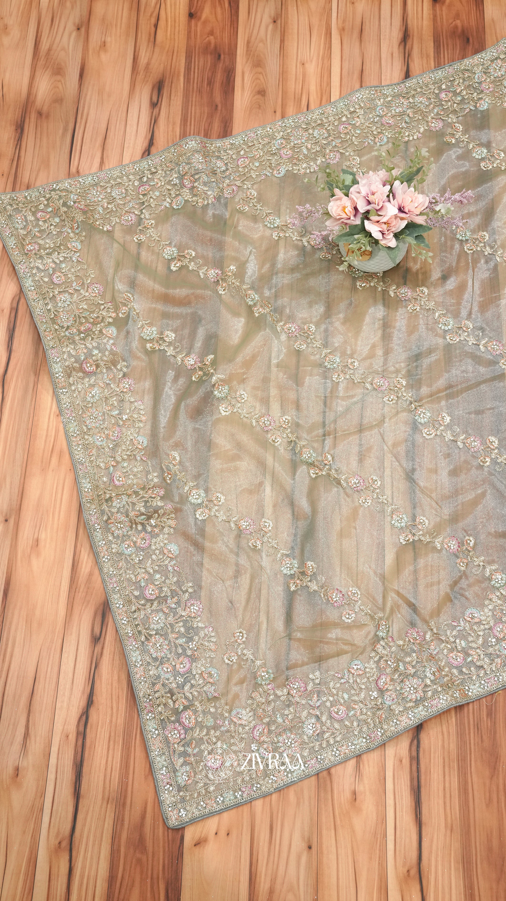 Gold Embroidered shimmer net Saree with Floral Zari & Border