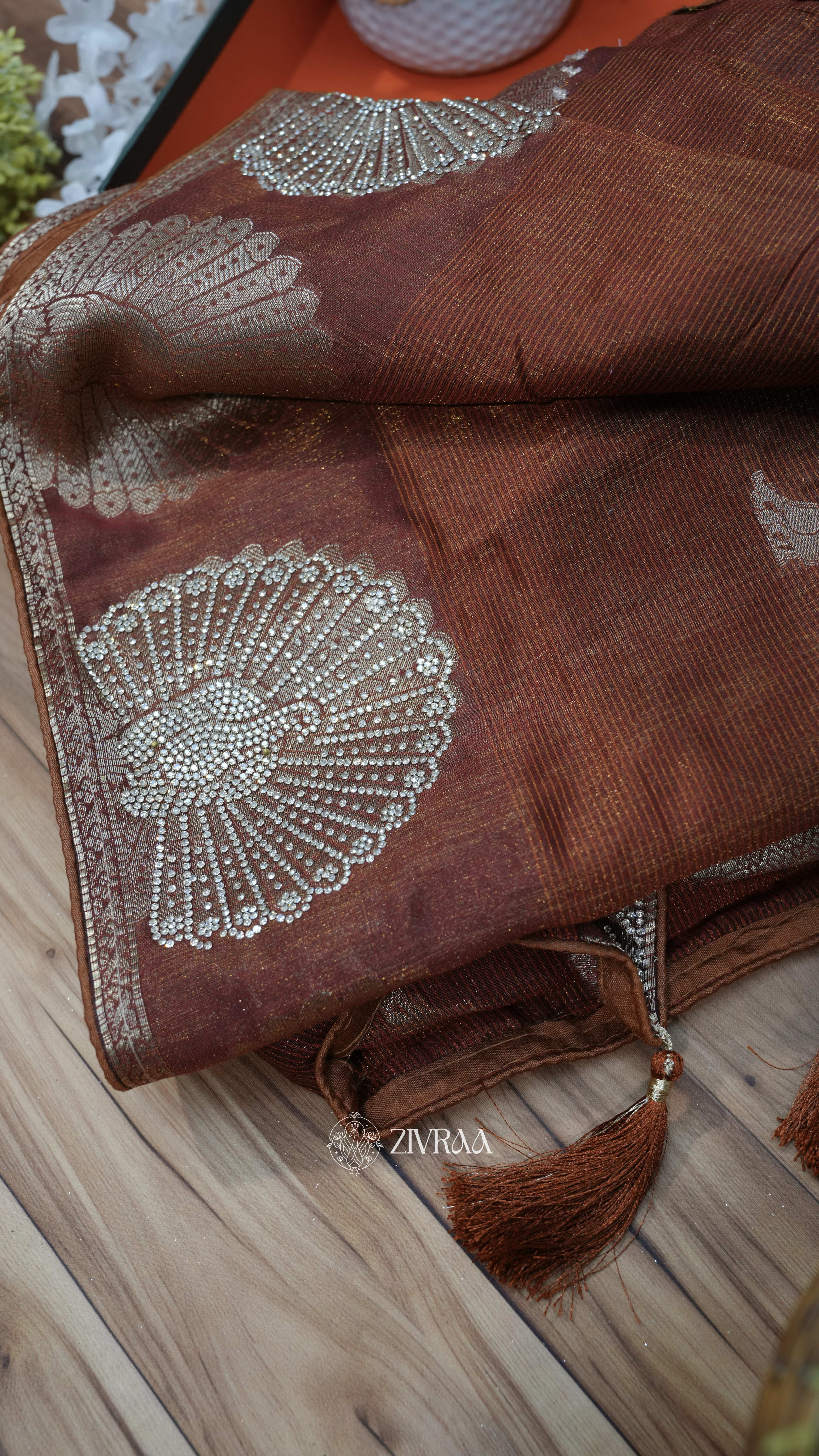 Mustard machine woven Saree with Silver Motifs & Tassel Pallu