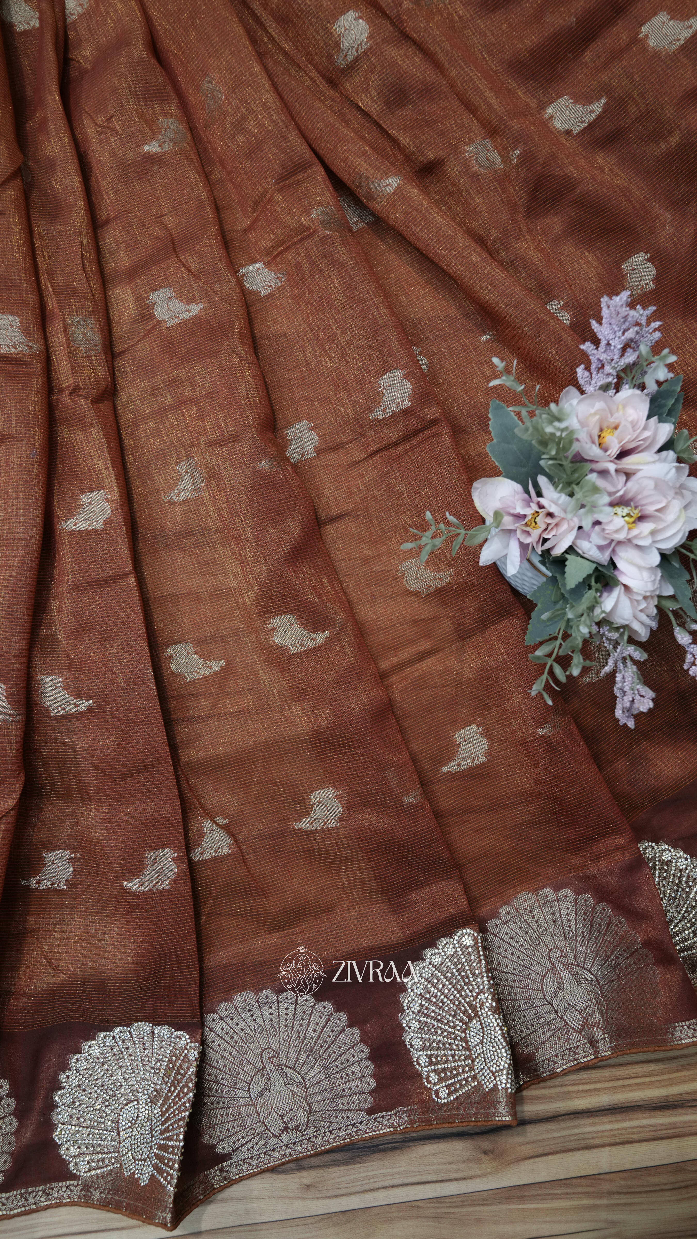 Mustard machine woven Saree with Silver Motifs & Tassel Pallu