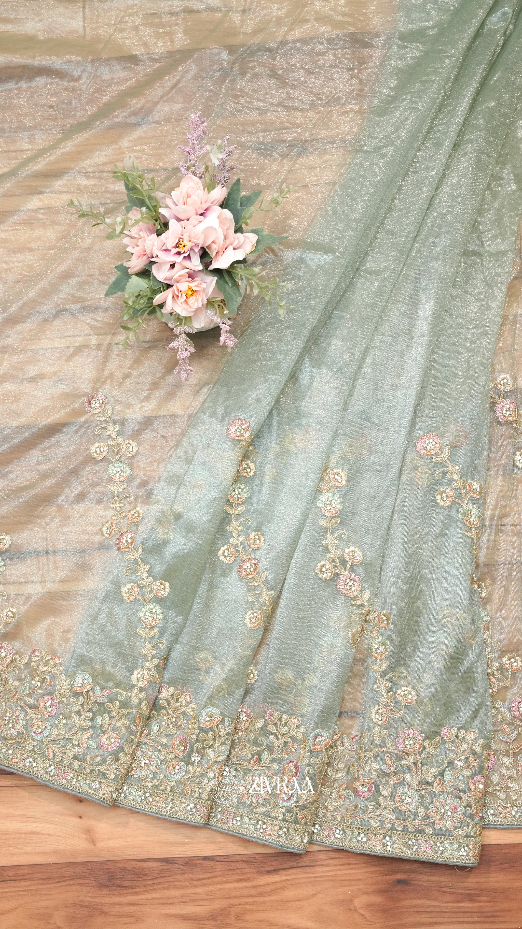 Elegant Teal Green Embroidered Shimmer Net Saree with Floral Zari & Stone Work