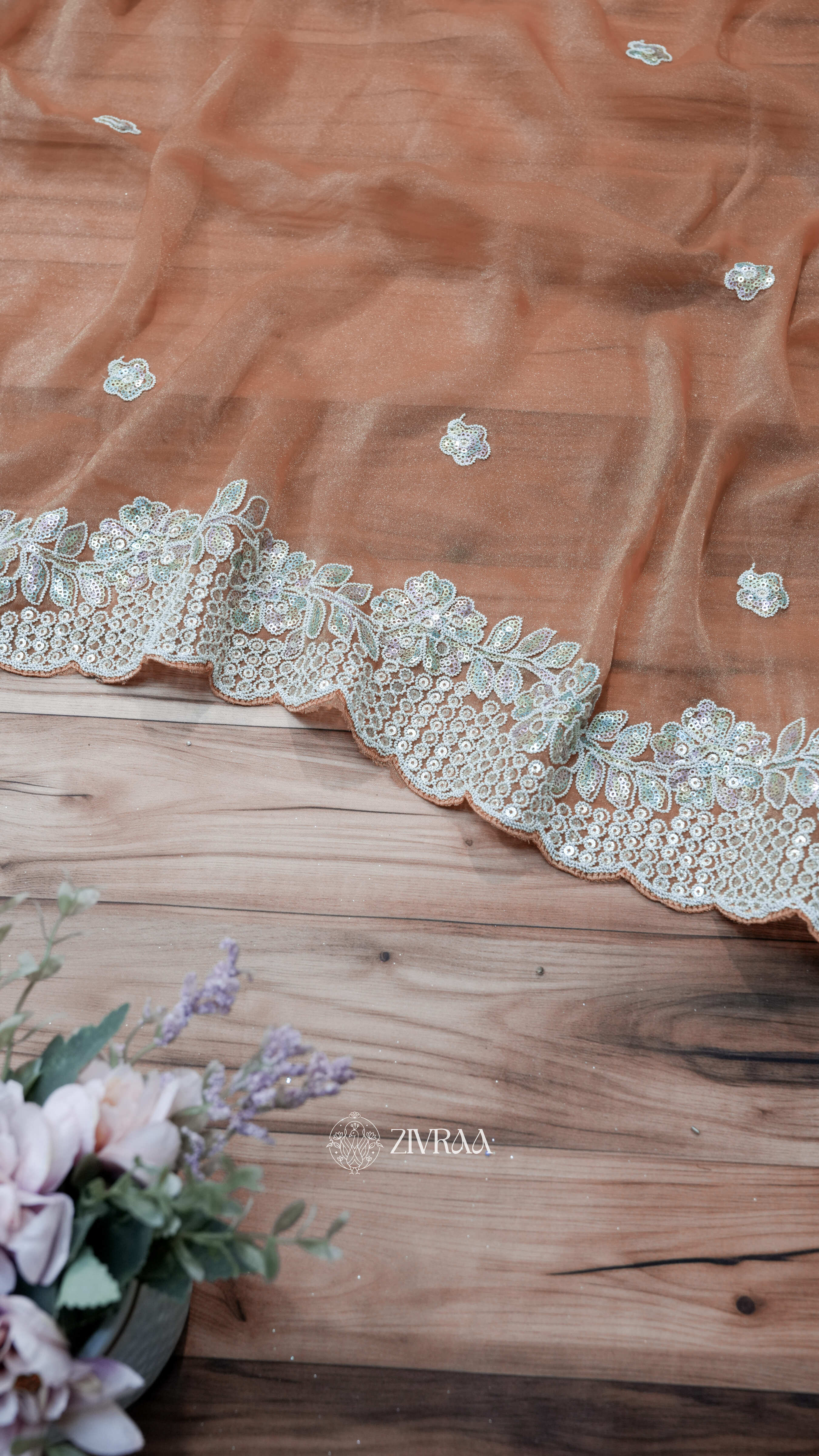 elegant sea green saree with a sequin and thread embroidery