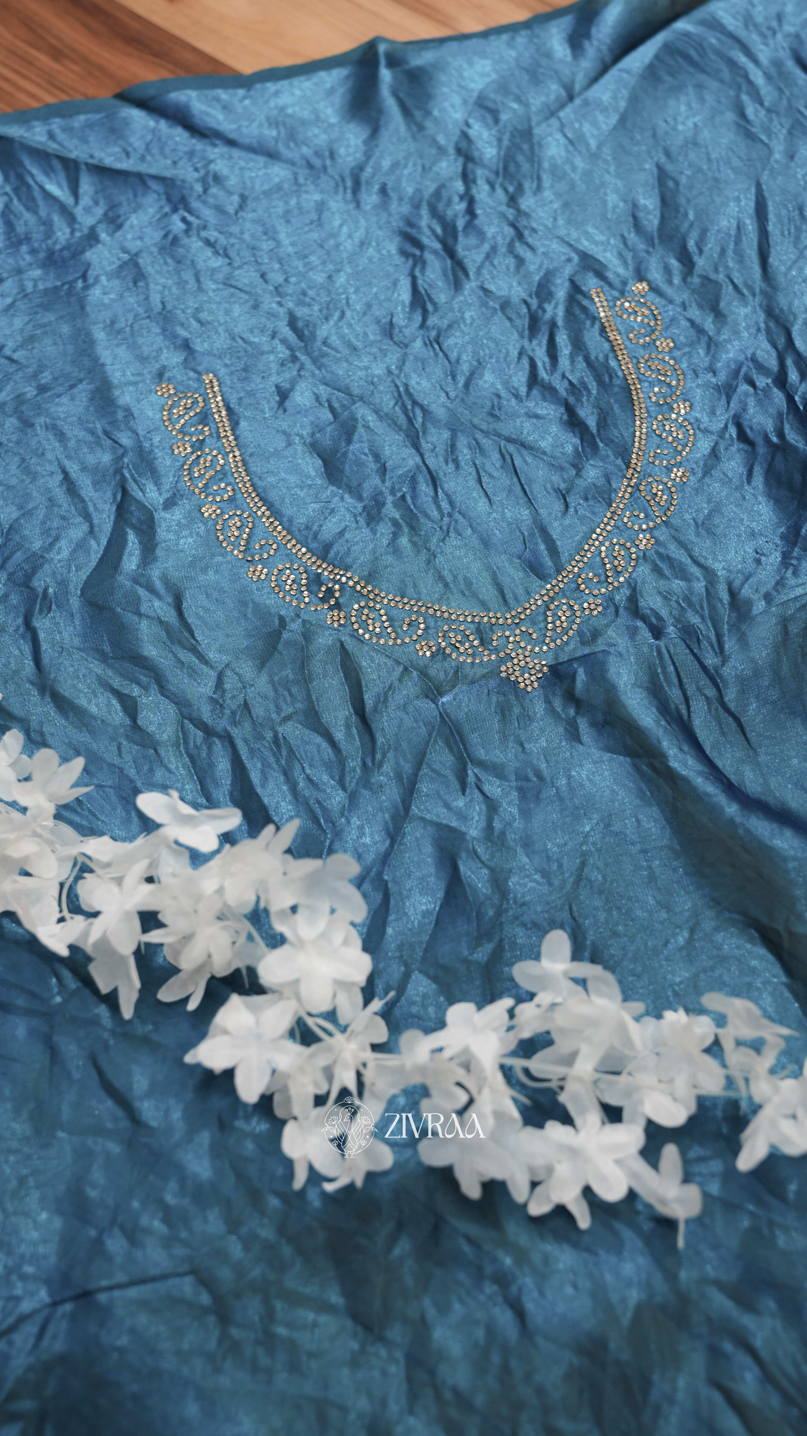 Elegant Teal Blue Fendi Silk Saree with Floral Stone Border