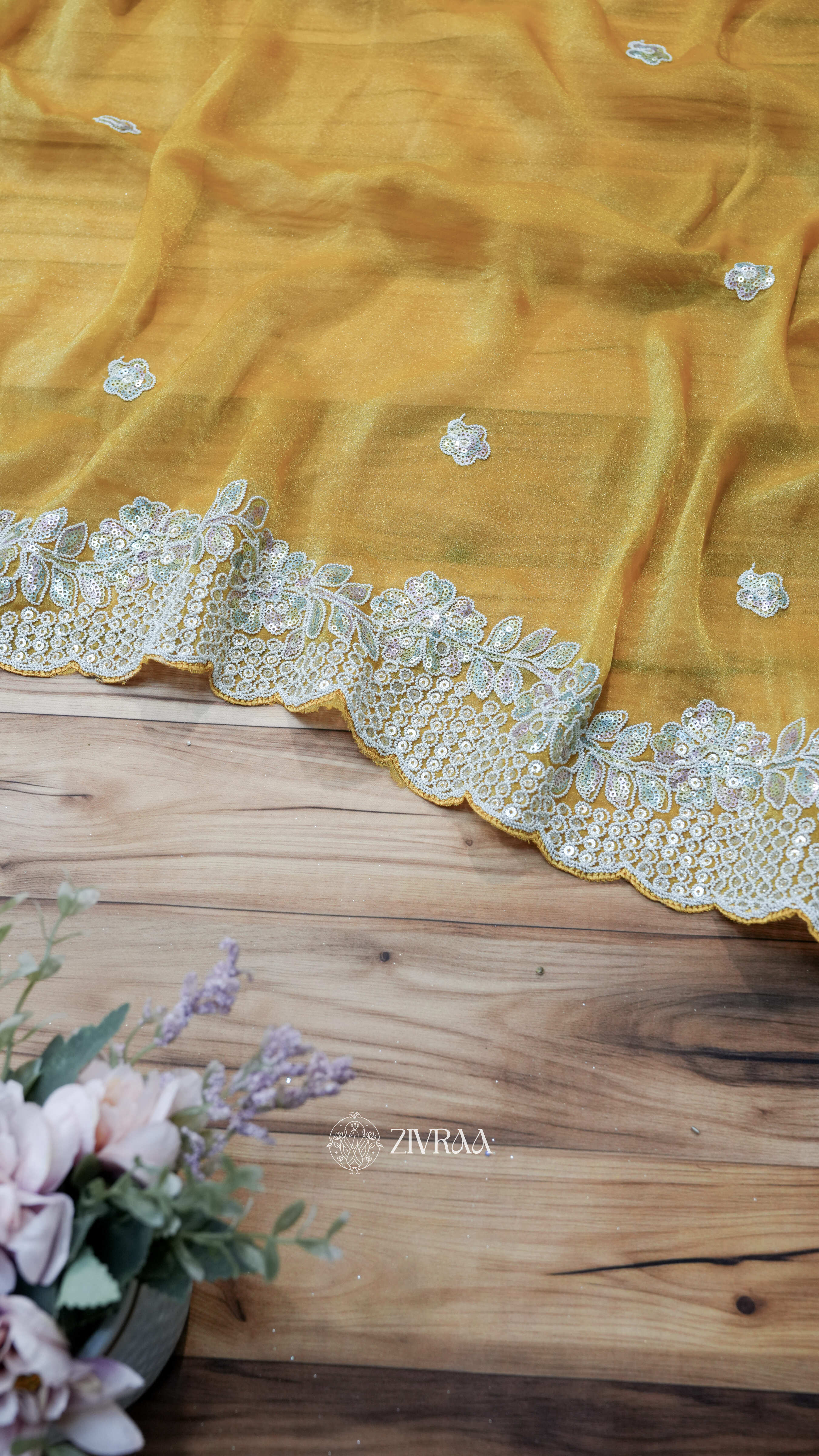 elegant sea green saree with a sequin and thread embroidery