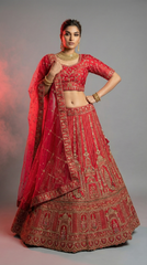 Rani Bridal Lehenga Choli with Heavy Gold Embroidery & Net Dupatta